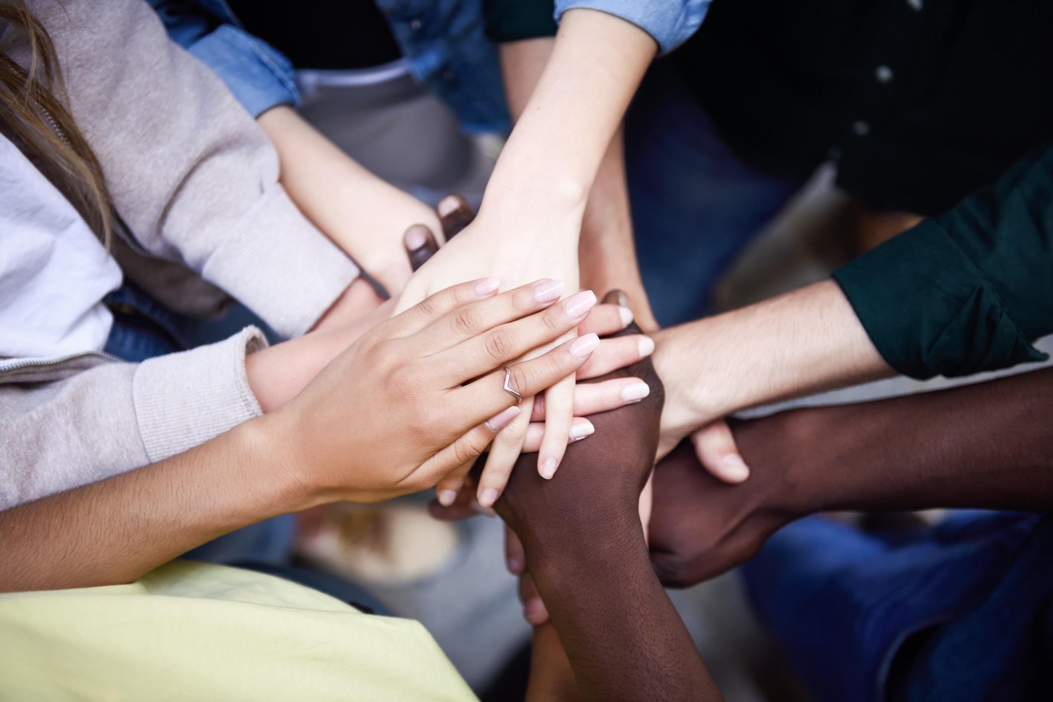 High Angle View Of Friends With Stacked Hands